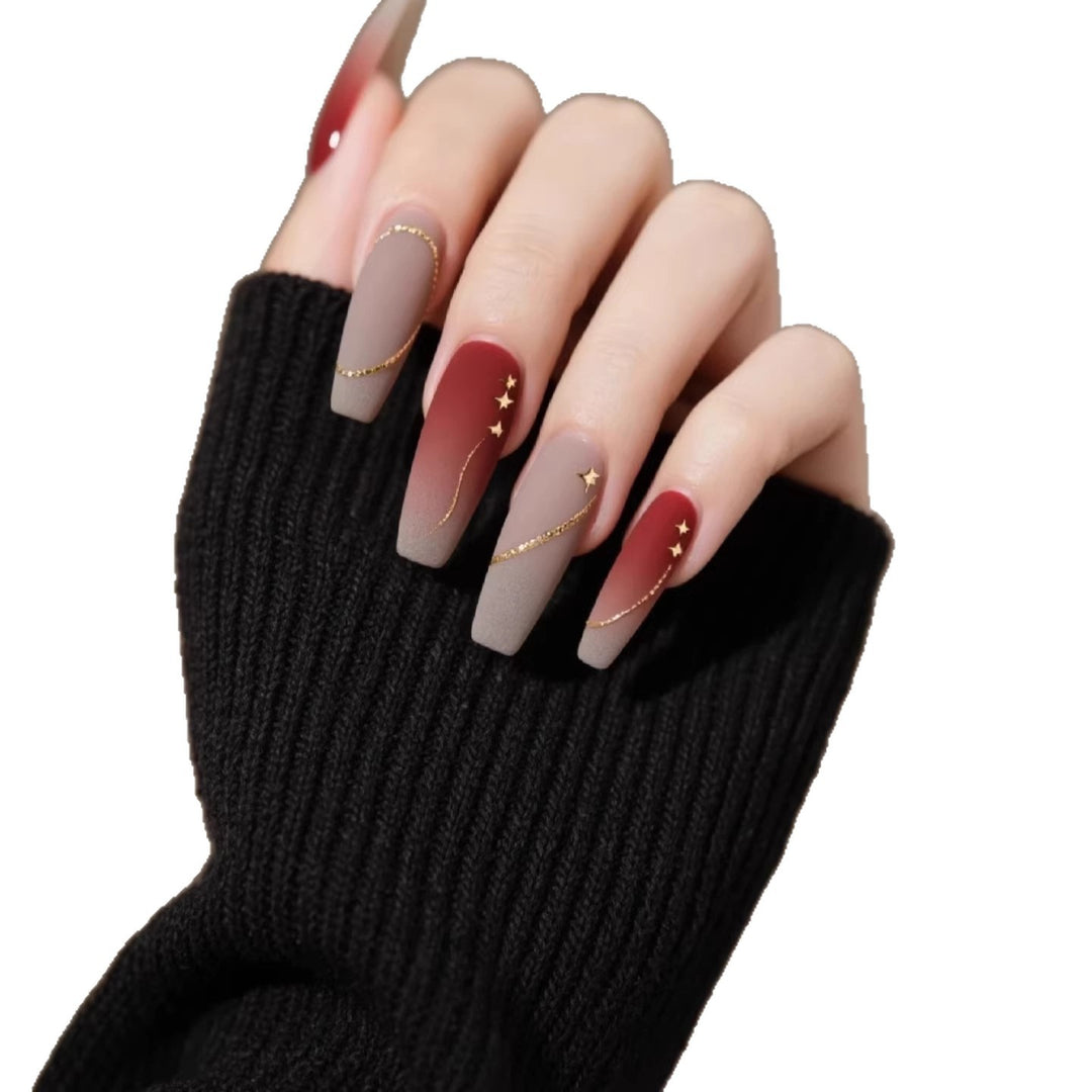 Künstlerisches Gradient Press-On Nagelset mit Sternakzenten