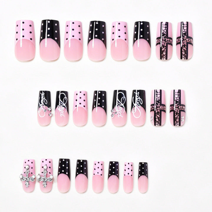 Künstlerisches Lang-Press-On-Nageldesign-Set mit Kreuzakzenten Karnz