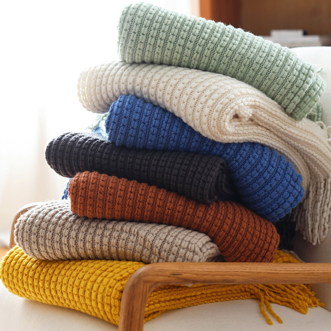 Gemütliche Strickwurfdecke