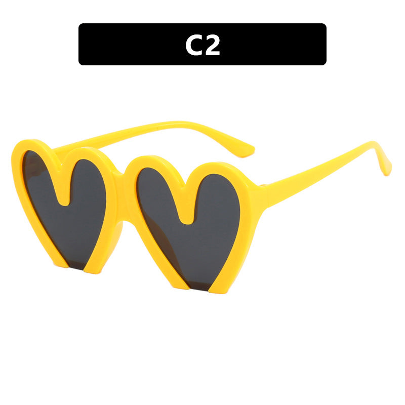 Damen Herzförmige Sonnenbrille mit robustem Kunststoffrahmen und UV-Schutz Karnz