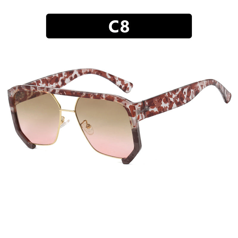Damen modische Oversized-Sonnenbrille mit eleganter, facettierter Rahmenkonstruktion Karnz