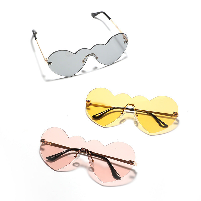 Damen extravagante Herz-Sonnenbrille mit schützenden Gläsern Karnz