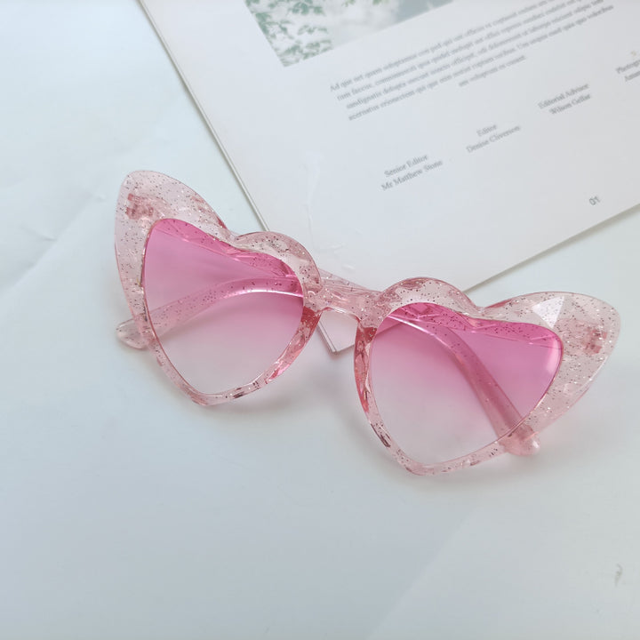Damen Herzförmige Sonnenbrille mit transparenten Gläsern Karnz