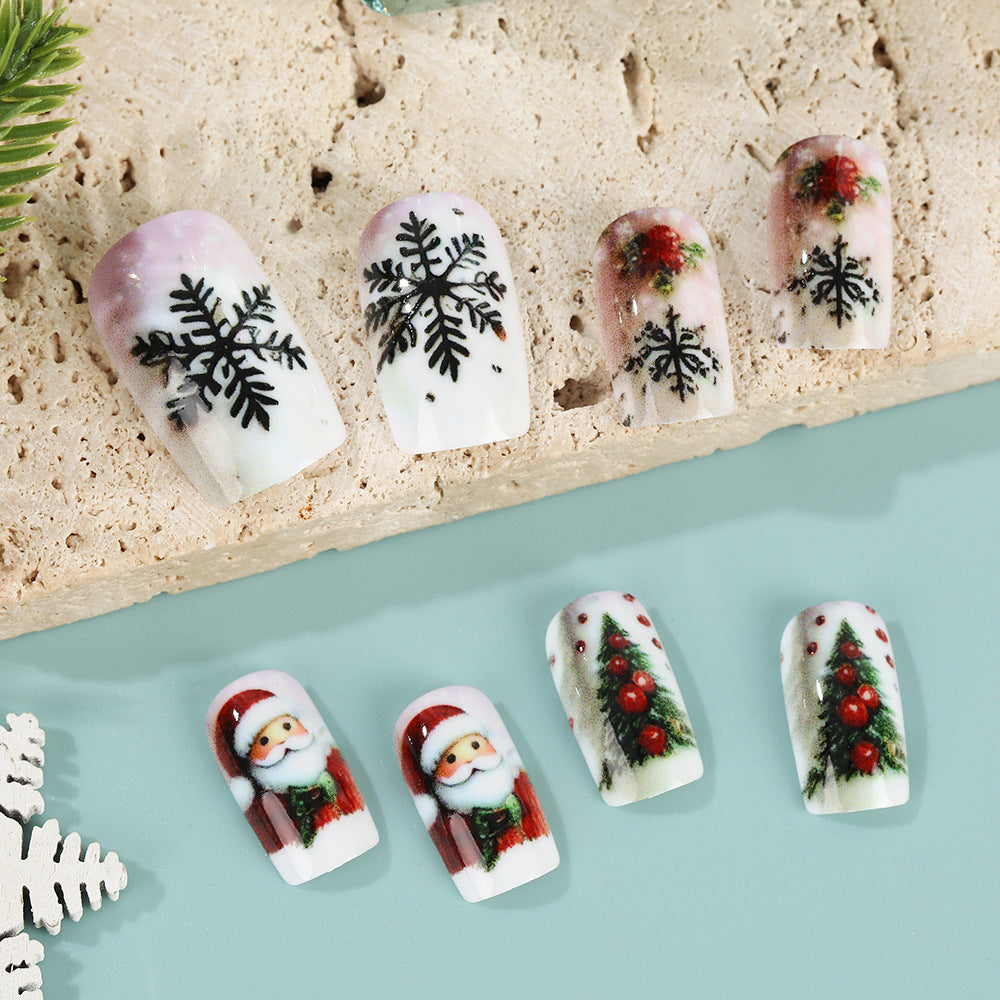 Festliche Kunstnägel mit Weihnachtsmotiven Karnz