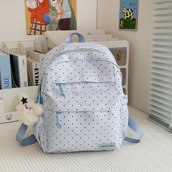 Verspielter gepunkteter Rucksack