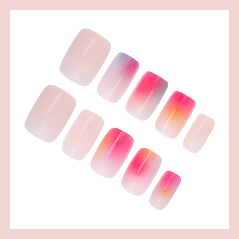 Kunstnagelset mit elegantem Farbverlauf und glitzernden Akzenten Karnz