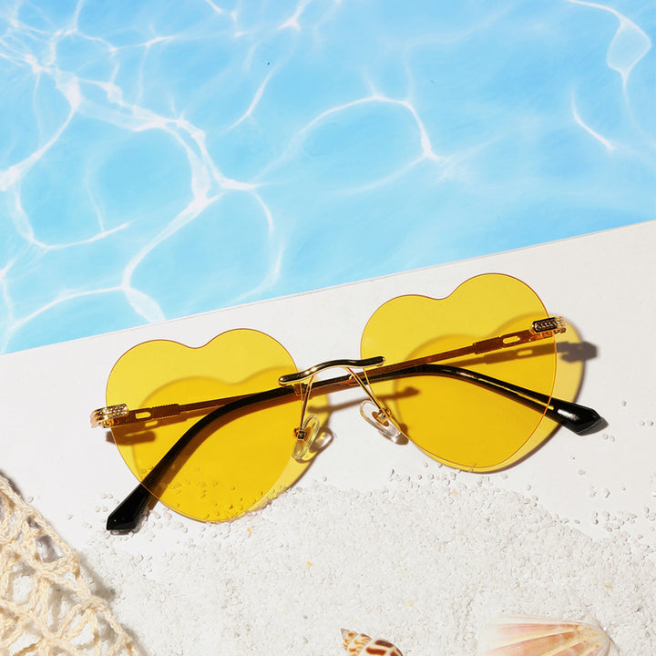 Damen trendige Herz-Sonnenbrille mit verspiegelten Gläsern Karnz