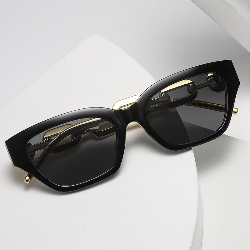 Damen Cat-Eye Sonnenbrille mit dekorativem Kettenrahmen Karnz