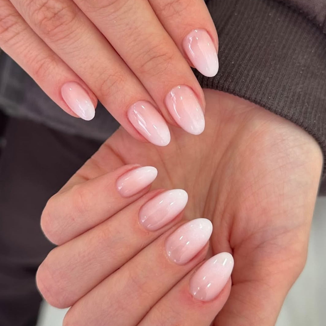 Künstliche Nagelkunst mit verspielten Punkten und Schleifen Karnz