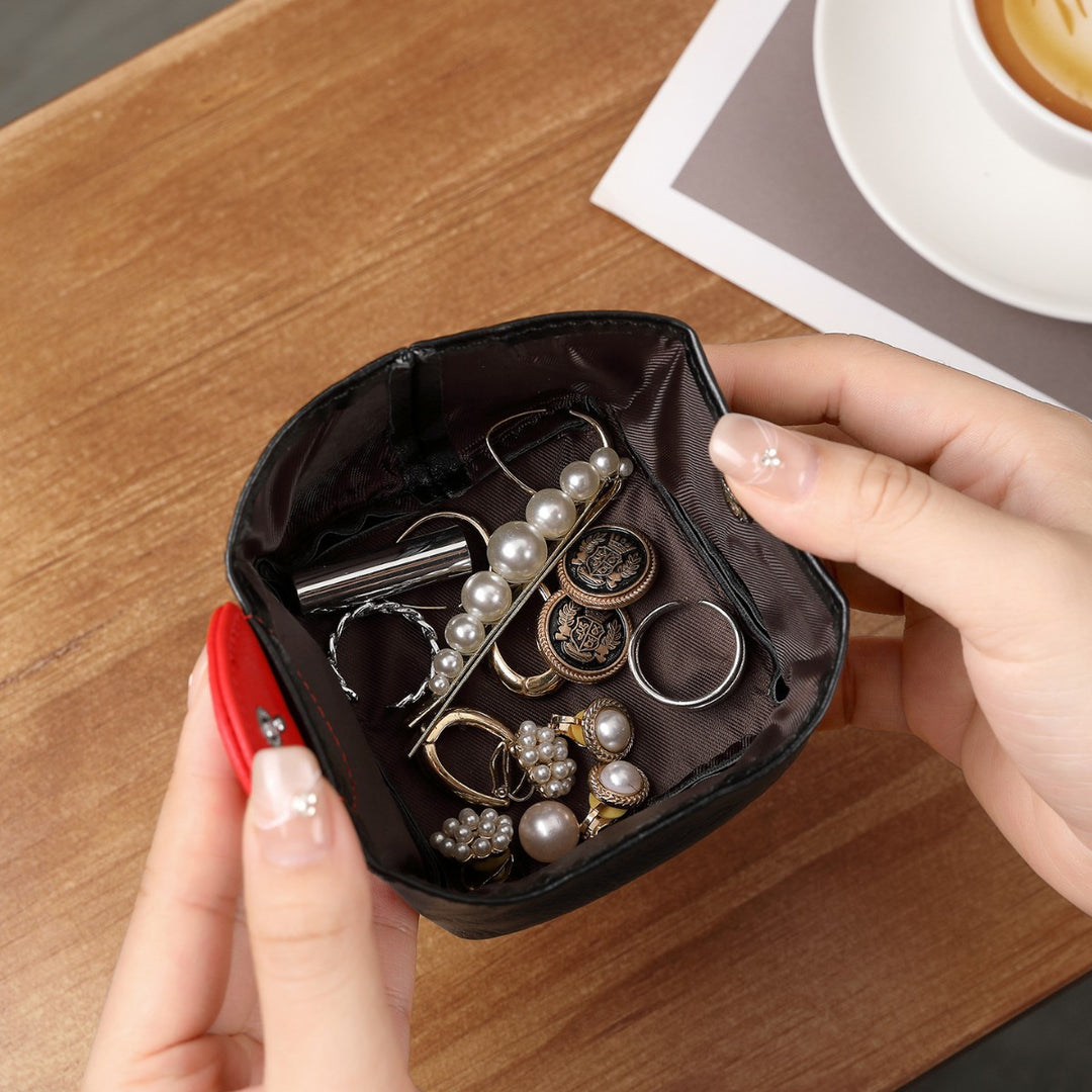Herz-verzierte Leder-Münztasche