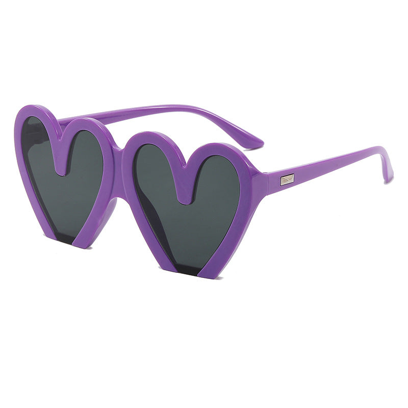 Damen Herzförmige Sonnenbrille mit auffälligem Design Karnz
