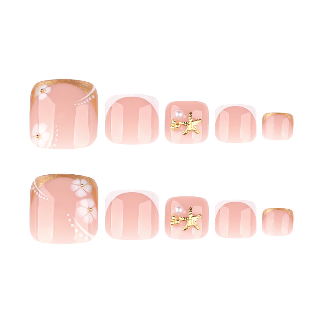 Kunstvolle Fußnagelkunst mit zarten Blüten- und Glitzerakzenten Karnz