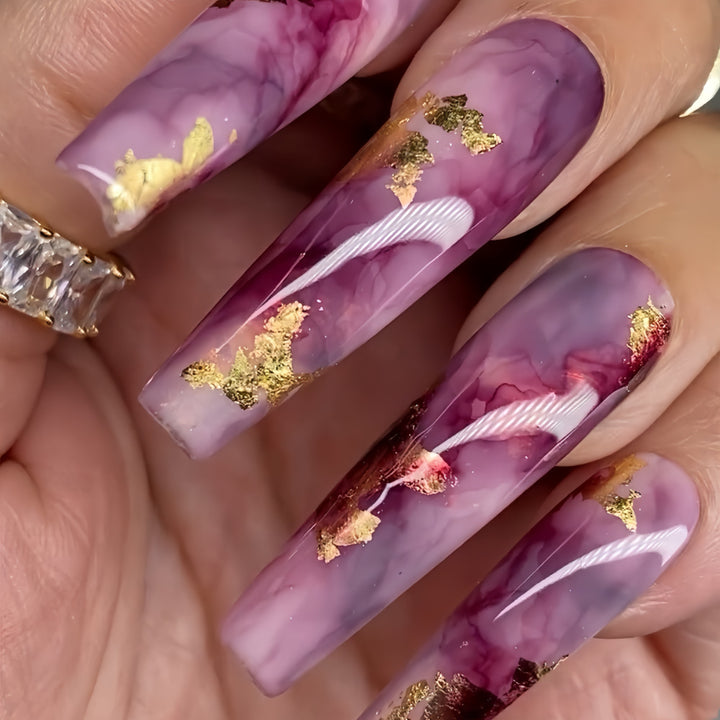 Elegante Kunstnägel mit Glitzer-Akzenten Karnz