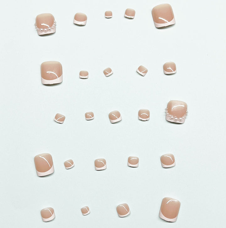 Kunstnagelset für Fußnägel mit eleganten Spitzenverzierungen Karnz