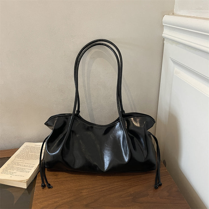 Glänzende Kunstleder-Handtasche