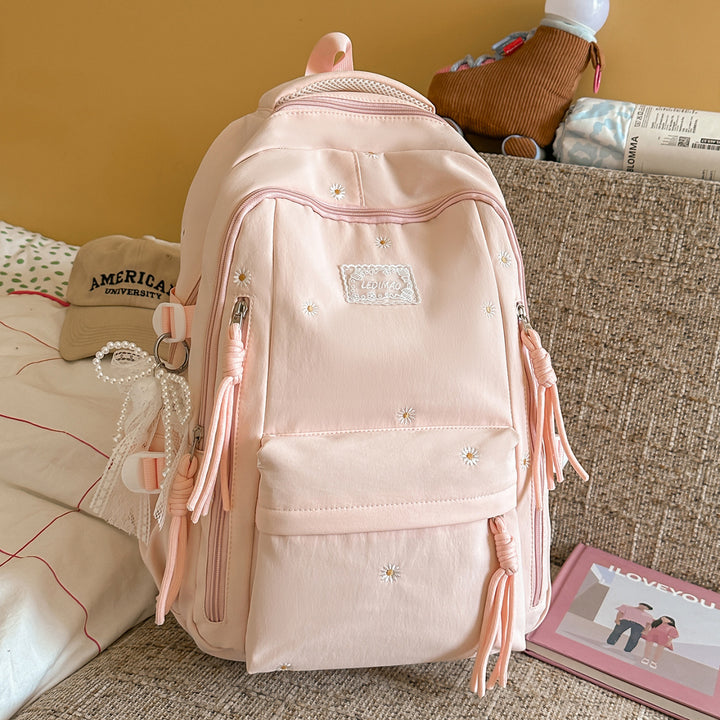 Modischer, blumenverzierter Rucksack