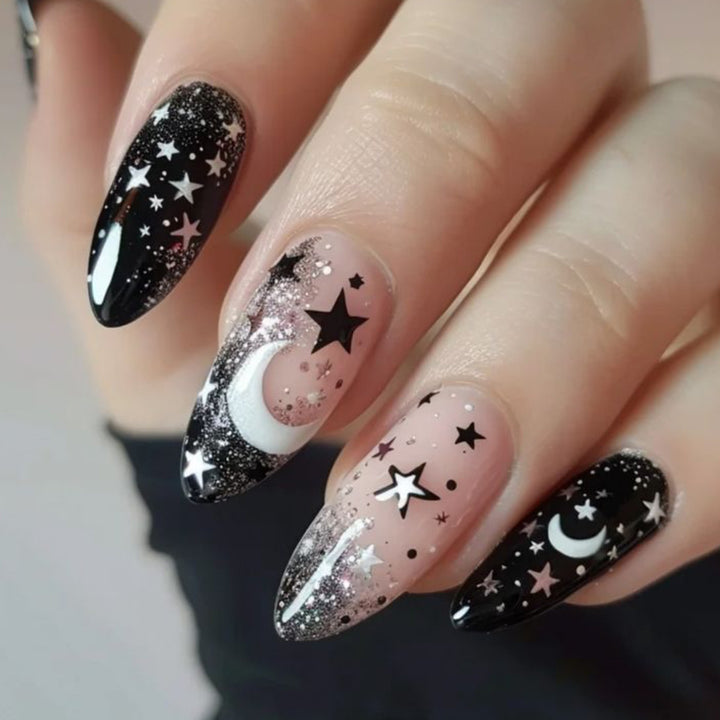 Stiletto Nagelkunstverlängerungen mit himmlischem Design Karnz