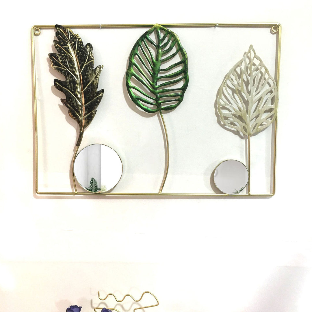 Dekorative Metallwandkunst mit tropischem Blatt- und Spiegeldesign Karnz