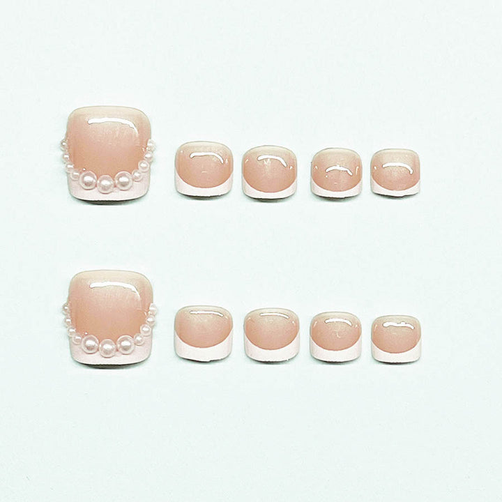 Kunstnagelset für Fußnägel mit eleganten Spitzenverzierungen Karnz