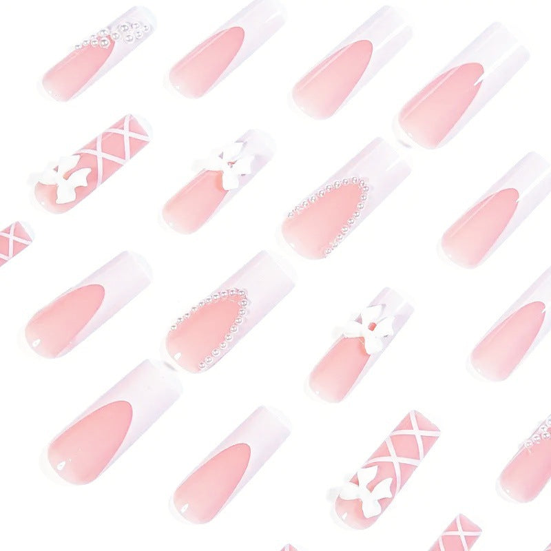 Kunstnagelset mit eleganten 3D- Schleifen und Perlenverzierungen Karnz