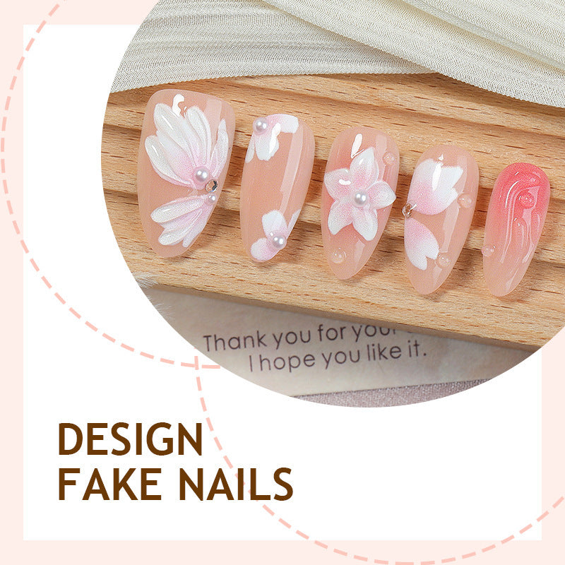 Kunstnagelset mit floralen Motiven und Strassverzierungen Karnz