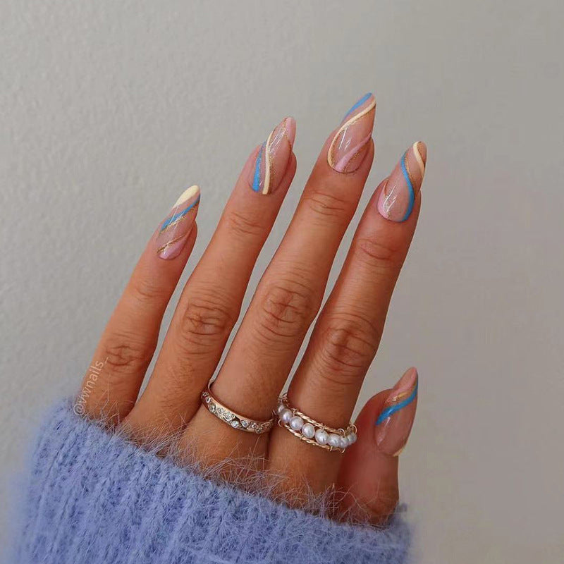 Künstlerische Stiletto Press-On Nägel mit buntem Liniendesign Karnz
