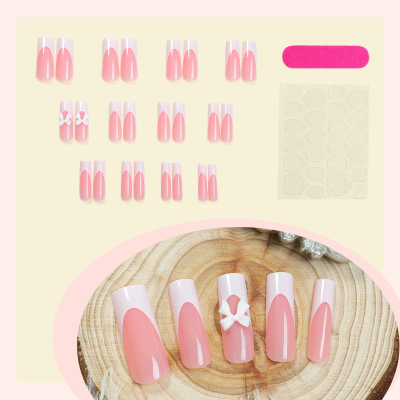 Elegantes Press-On Nagelset mit dekorativen Schleifen Karnz