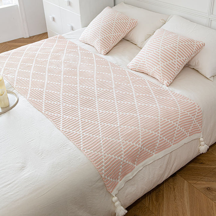 Dekorativer Strickwurfdecke