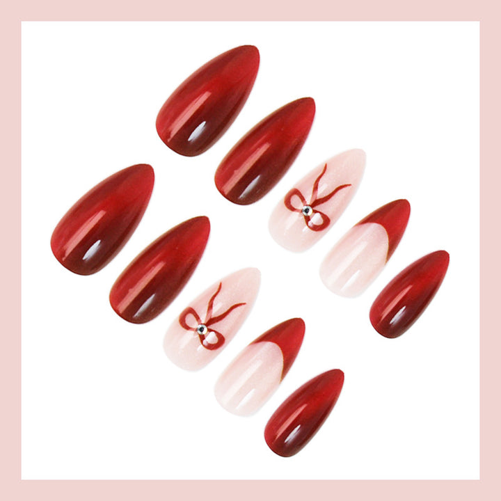 Kunstnagelset mit luxuriösen Ombre-Effekten und filigranen Schleifen Karnz