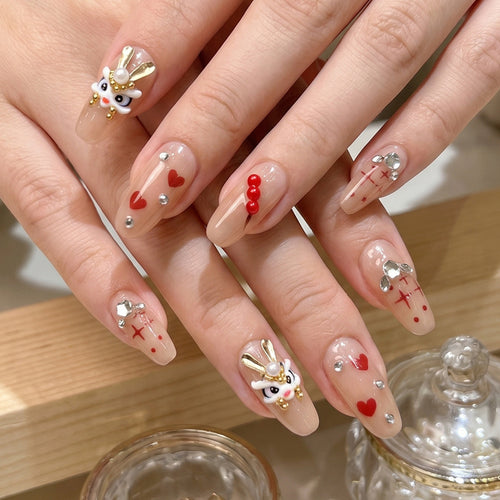Künstlerisches Press-On Nagelset mit thematischen Hasen- und Herzdesigns Karnz