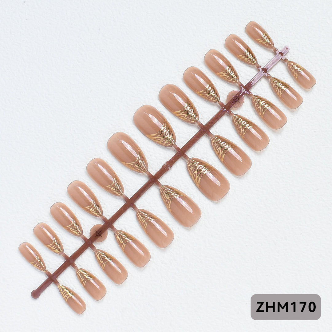 Elegante Press-On Nagelspitzen mit goldenen Details Karnz