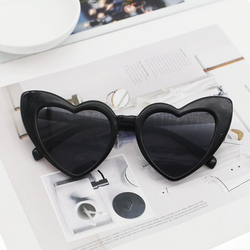 Damen Herzförmige Sonnenbrille mit glitzerndem Rahmen Karnz
