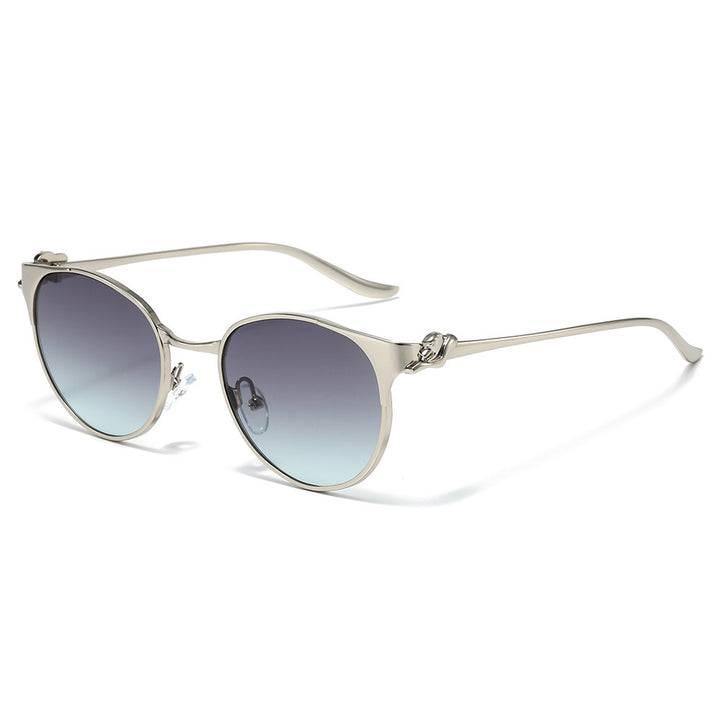 Elegante Cat-Eye-Sonnenbrille mit dekorativen goldenen Akzenten Karnz