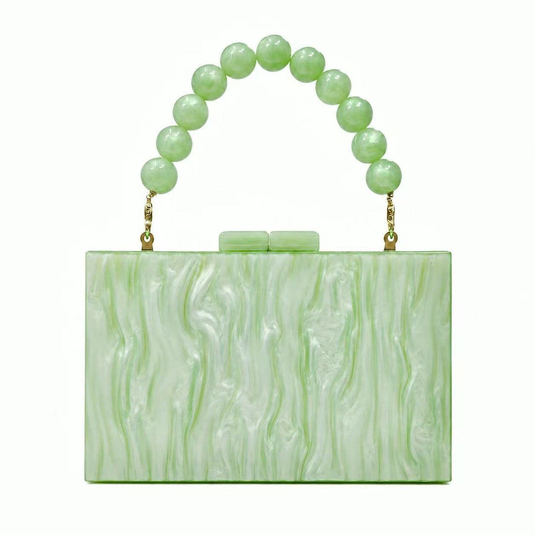 Elegante akribisch strukturierte Handtasche