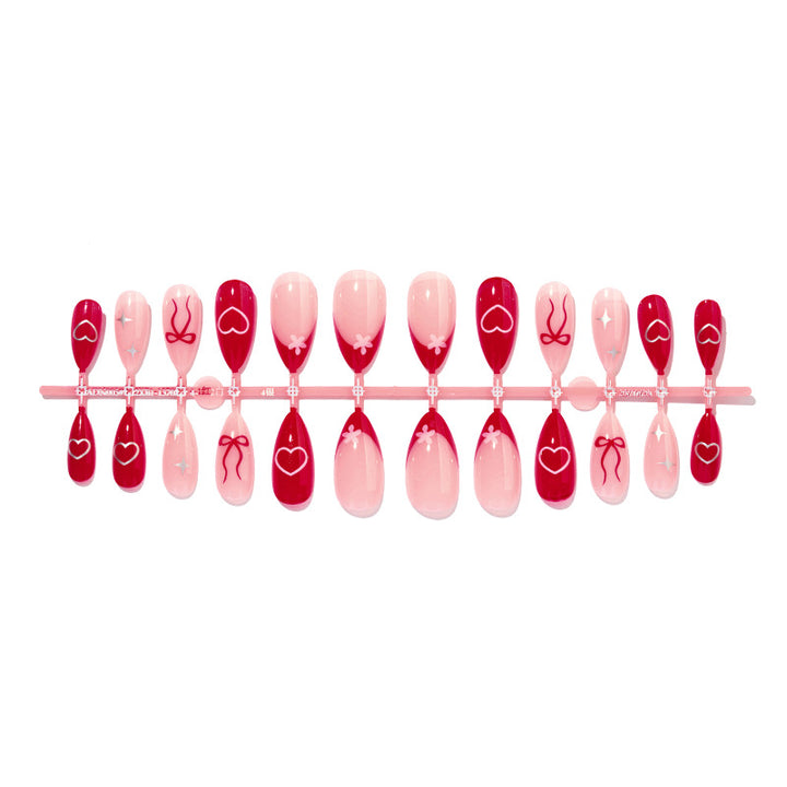 Dekorativer Druck-Nagel-Set mit charmanten Kirsch- und Schleifen-Designs Karnz