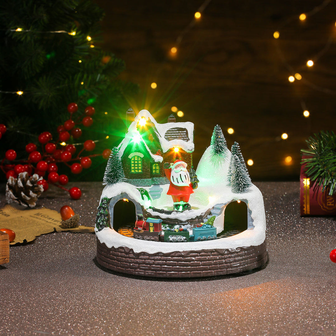 Beleuchtete Weihnachts-Schneekugel-Szene Karnz