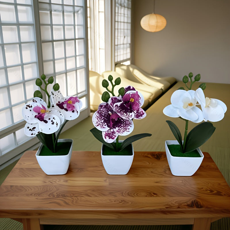 Dekorative künstliche Orchideenarrangement für die Wohnkultur展示