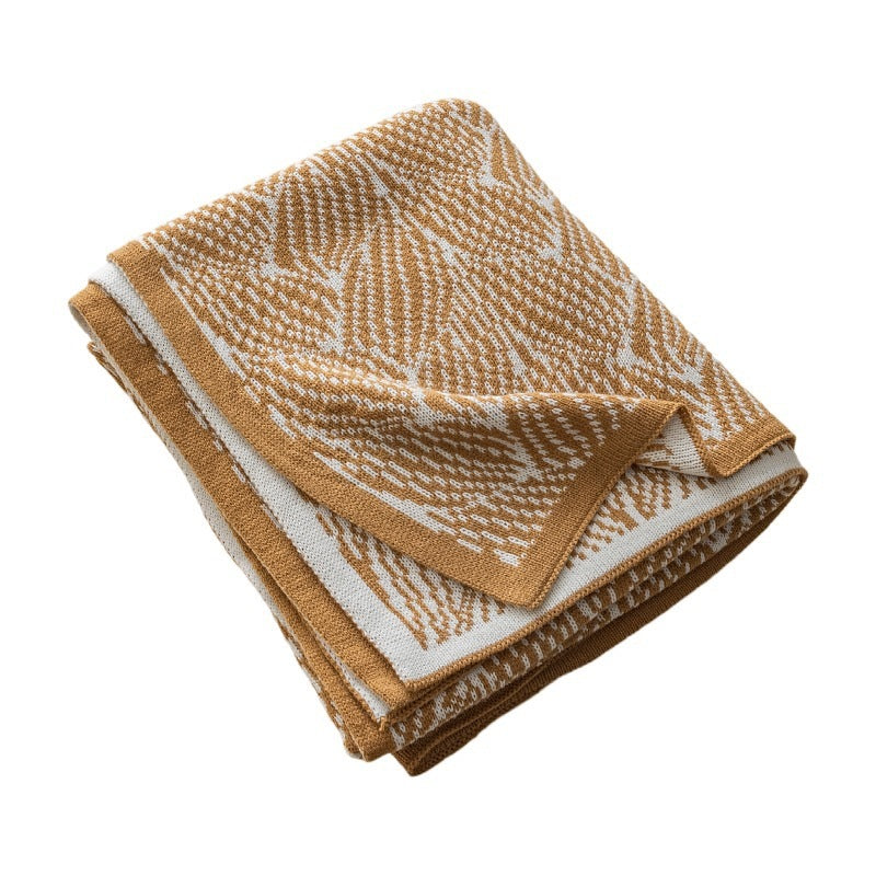 Dekorativer Strickwurfdecke