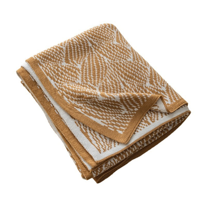 Dekorativer Strickwurfdecke