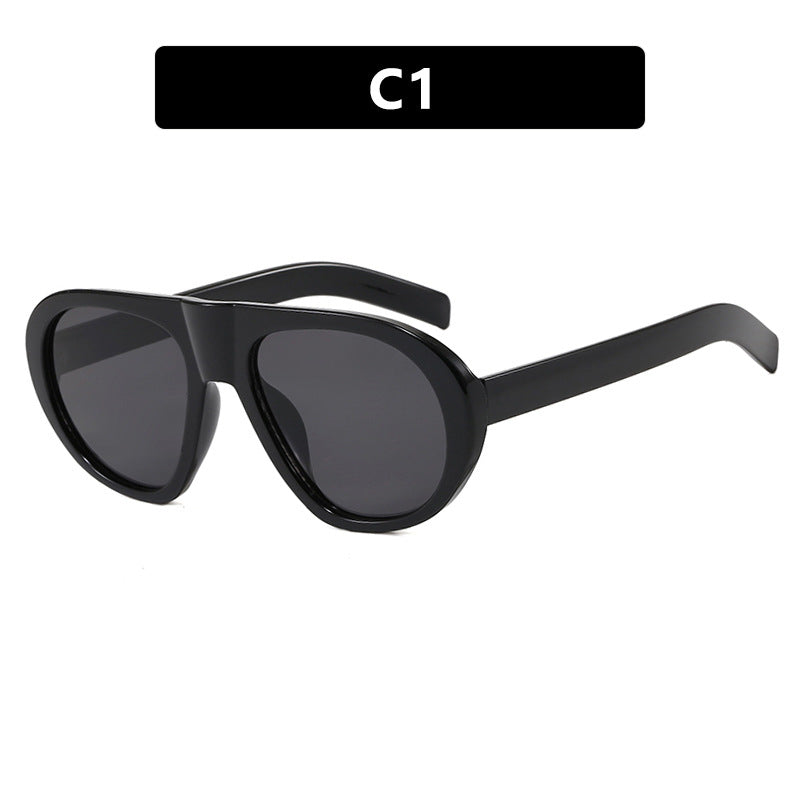 Damen auffällige Sonnenbrille mit futuristischem Rahmen und robustem Design Karnz
