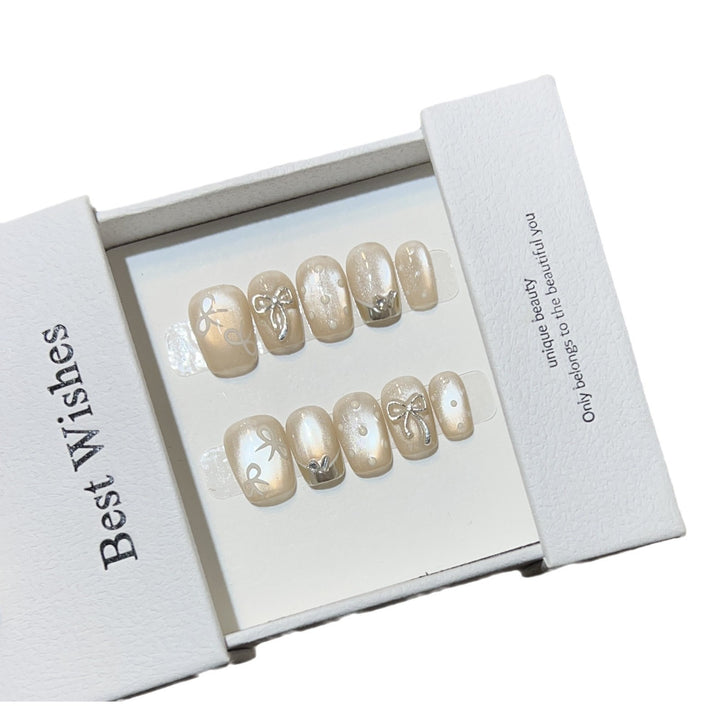 Elegantes mit Schleifen verziertes Press-On Nail Art Set Karnz