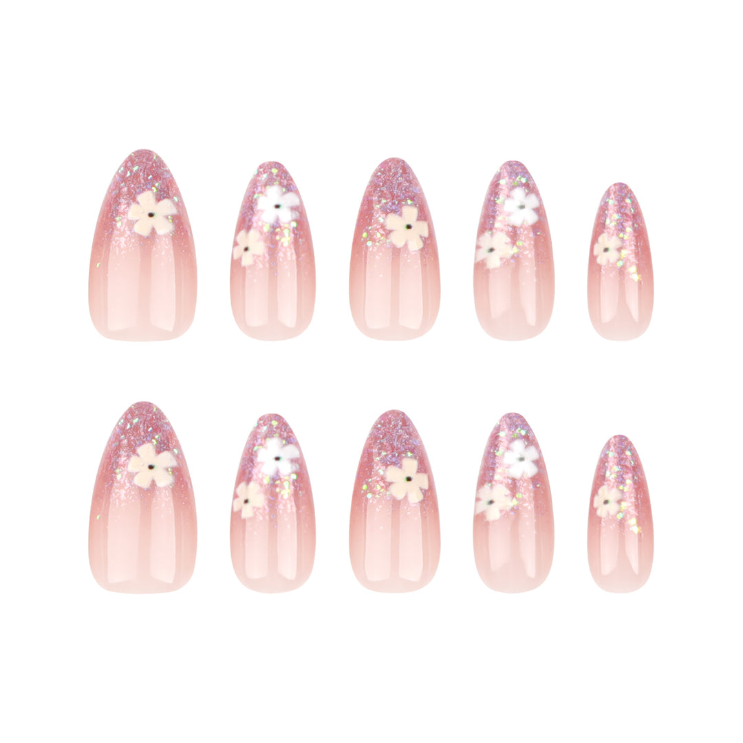 Glamouröse Nagelverlängerungen mit glitzerndem und floralem Design Karnz