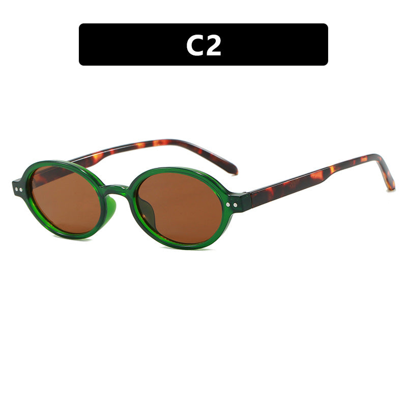 Damen modische ovalförmige Sonnenbrille mit ausgefallenem Rahmen Karnz