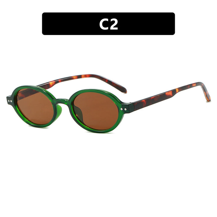 Damen modische ovalförmige Sonnenbrille mit ausgefallenem Rahmen Karnz
