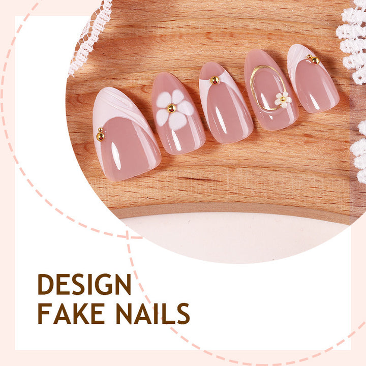 Kunstnagelset mit eleganten Blüten- und Glitzerakzenten Karnz