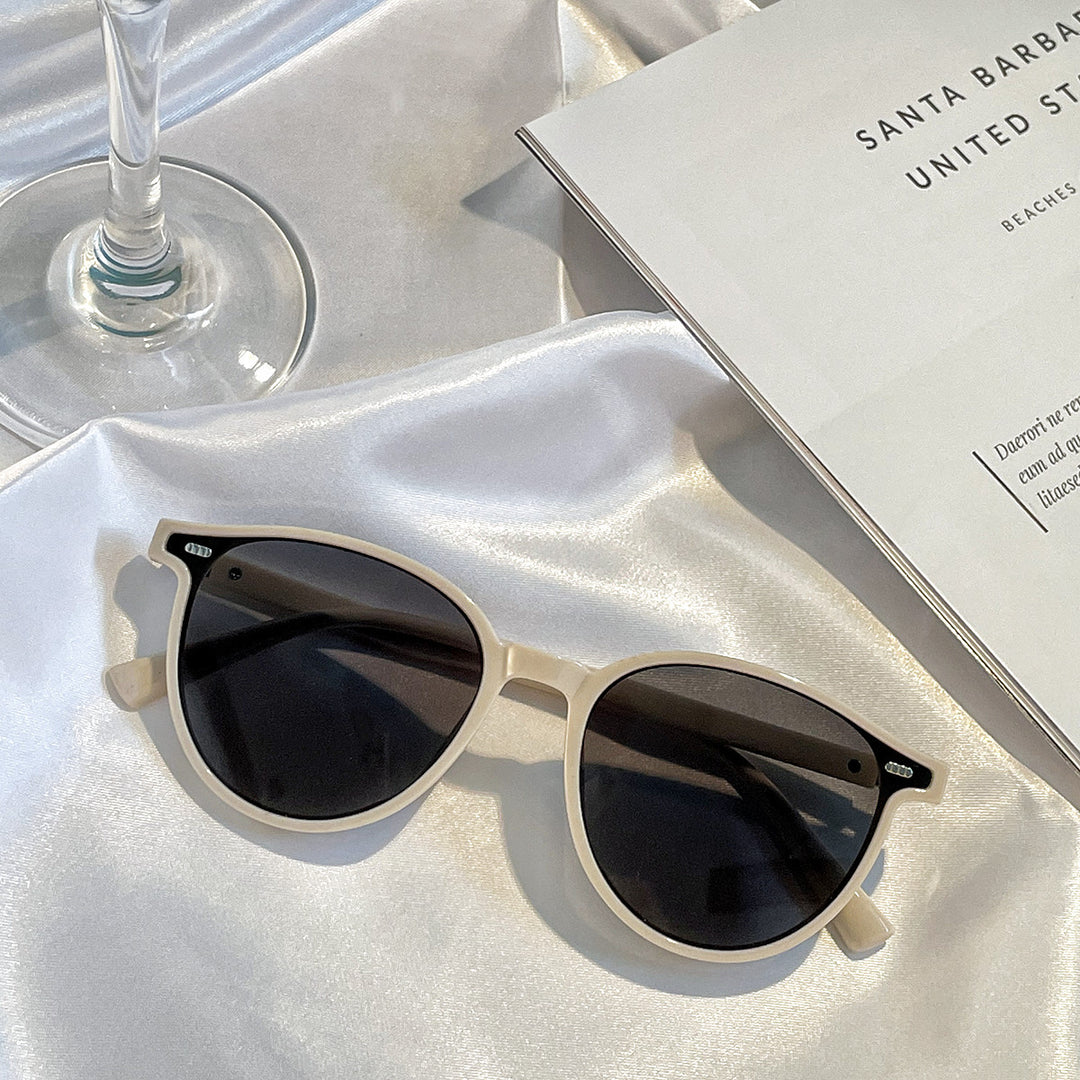 Damen stilvolle Sonnenbrille mit elegantem transparentem Rahmen Karnz
