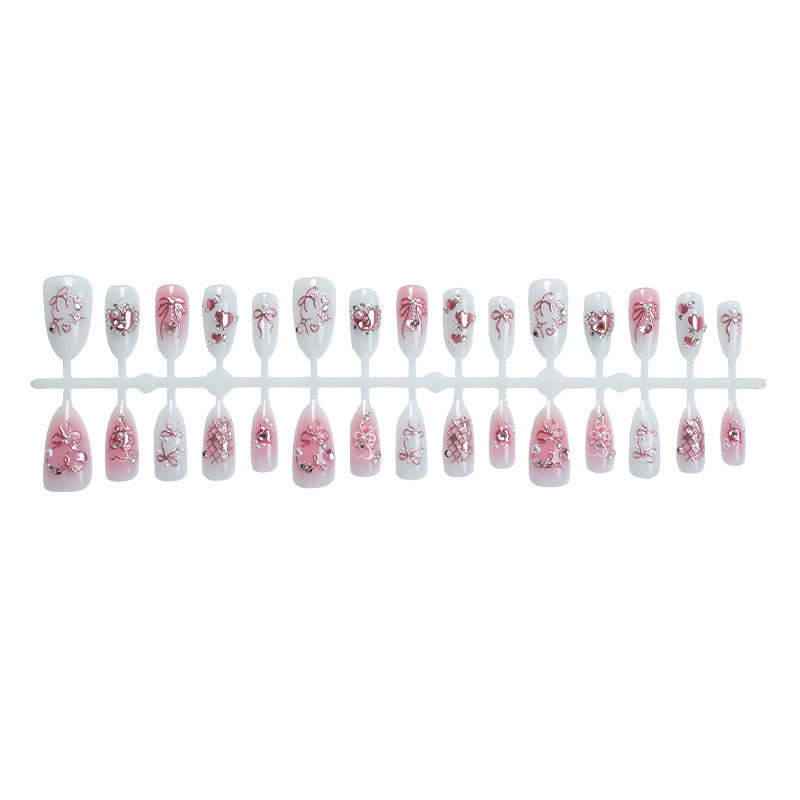 Elegantes Kunstnagelset mit floralen und Glitzerdetails Karnz
