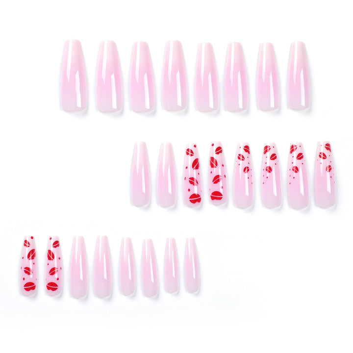 Kunstvolle Stiletto-Nägel mit Lippenmotiven Karnz