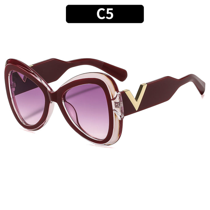 Elegante Cat-Eye-Sonnenbrille mit dekorativem Bügeldesign