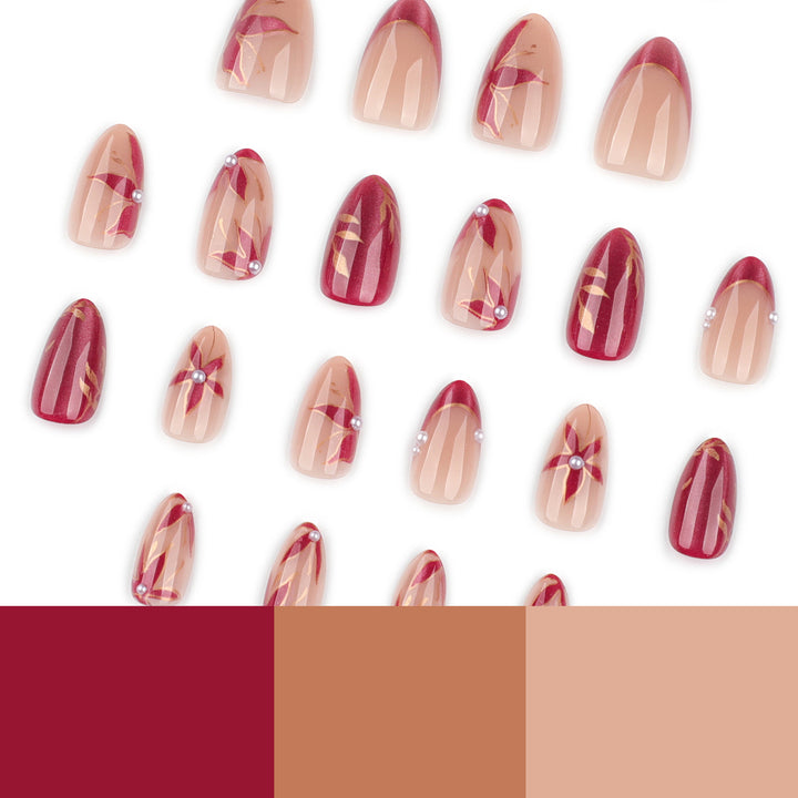 Kunstvolle Nagelverlängerungen mit retro-inspiriertem floralem Design Karnz